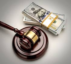 gavel with money next to it