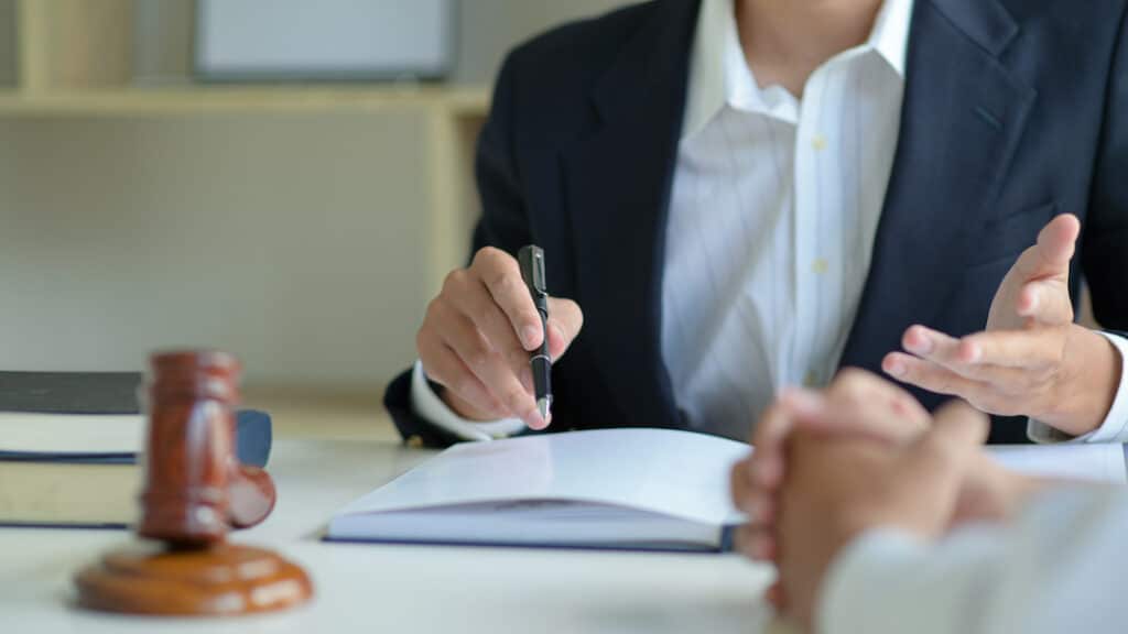 A lawyer talking to a client