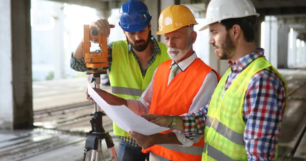 construction workers discussing plans