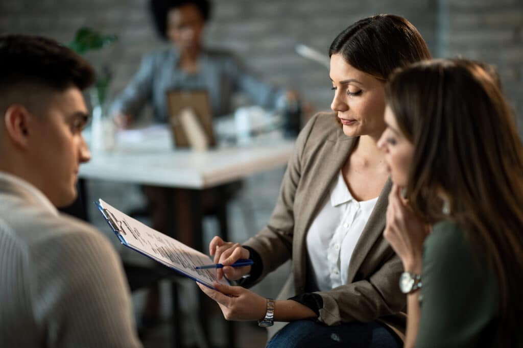 couple working with a mortgage lawyer