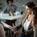 couple working with a mortgage lawyer