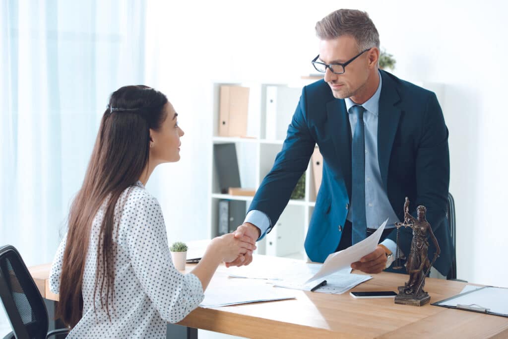 lawyer talking to client about compensatory damages