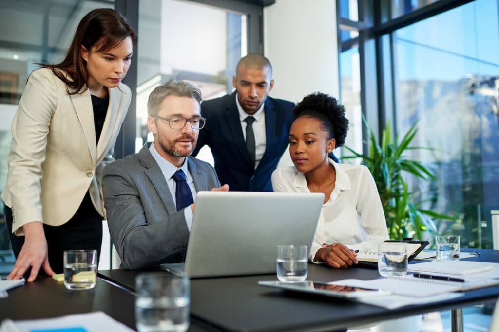 group of business people discussing how to start a business in california